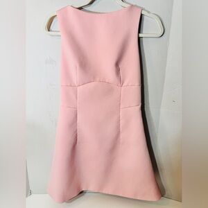 NEW WITH TAGS PINK MINI WITH CUTOUT BACK
